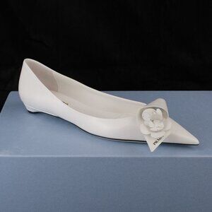 Prada Sculptural Twist Floral-Appliqued Ballerina Flats, White Polished Leather